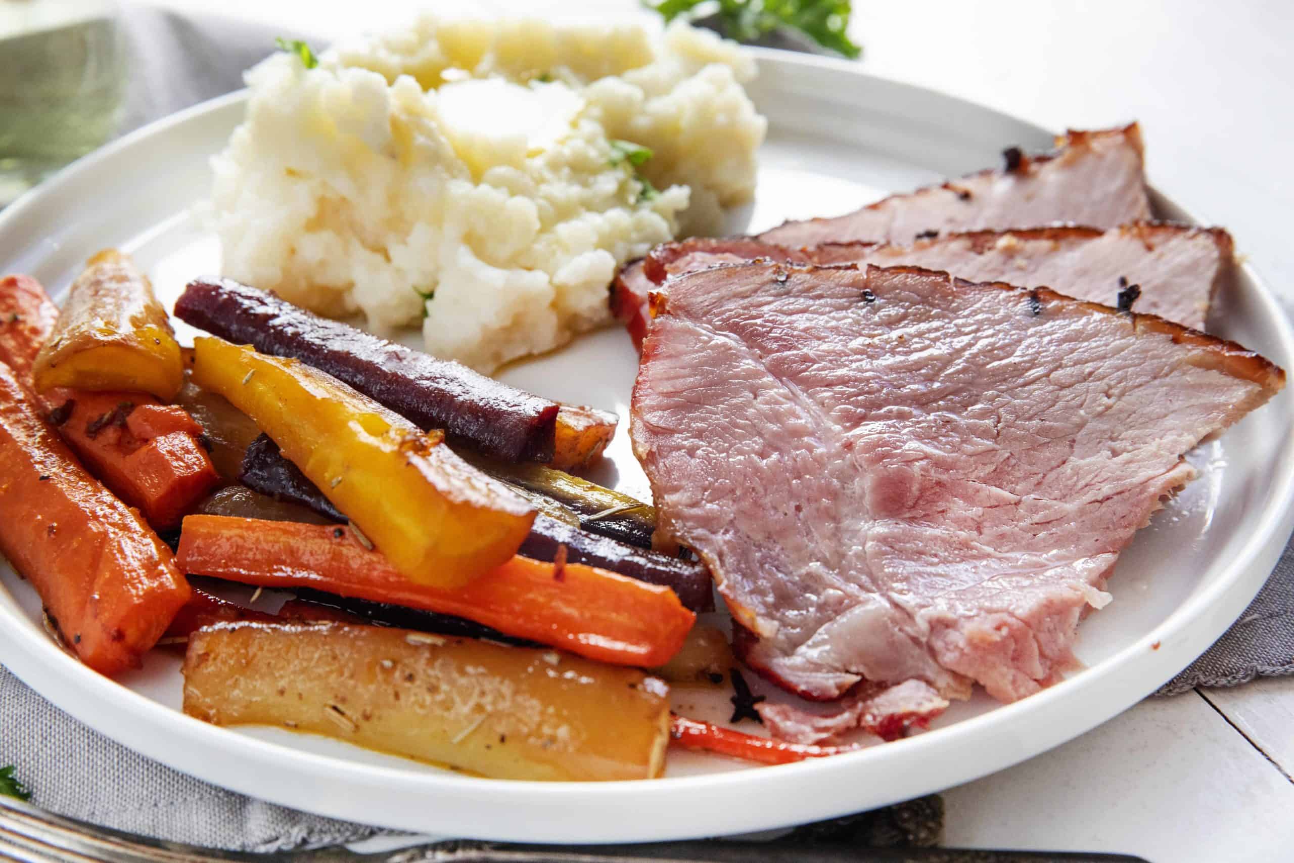 Ham Honey with Carrots on a White Plate