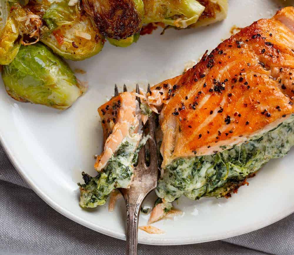 Spinach Stuffed Salmon is an easy an impressive meal! #salmon #salmonrecipes #seafood #spinach #spinachstuffed #spinachstuffedsalmon #iambaker Perfectly Pan Seared Salmon