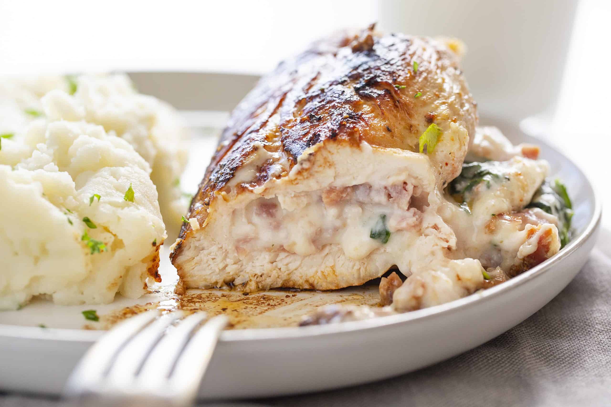 Easy Stuffed Chicken Recipe Cut Into Showing Filling