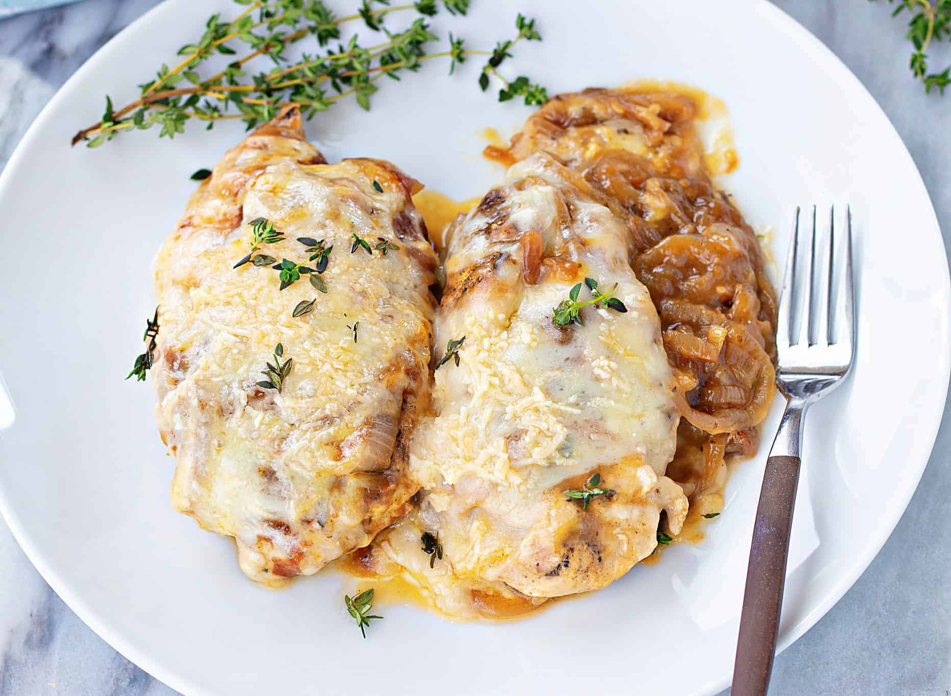 French Onion Chicken on White Plate with Fork