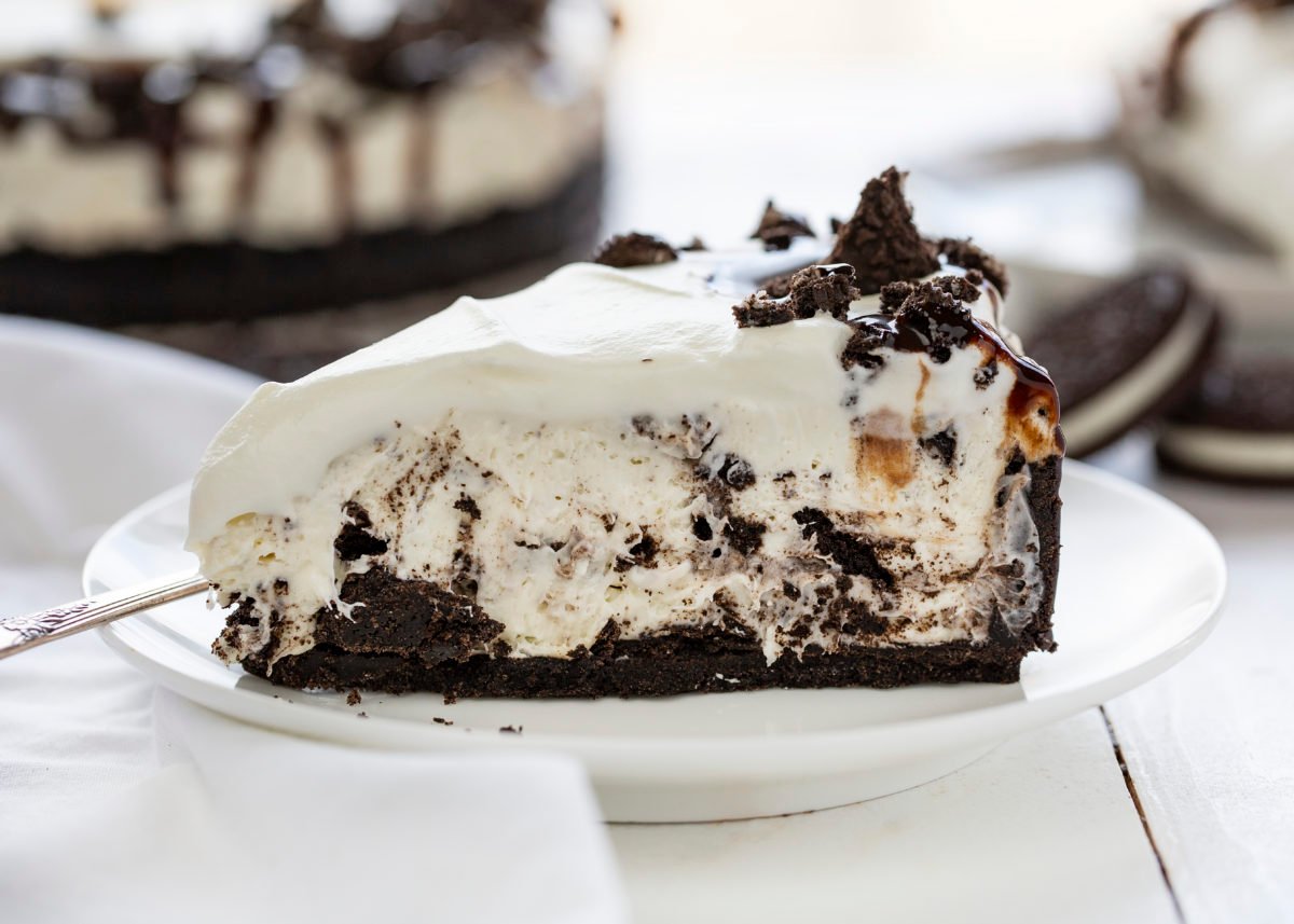 Oreo No Bake Cheesecake on a Plate Showing Side.