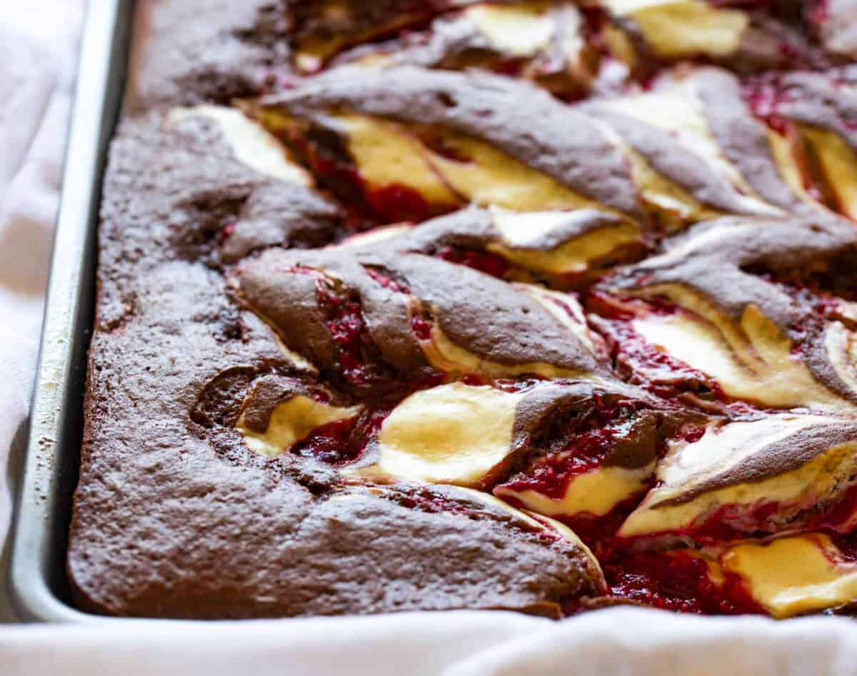 Close up of Raspberry Cheesecake Sheet Cake in the pan.