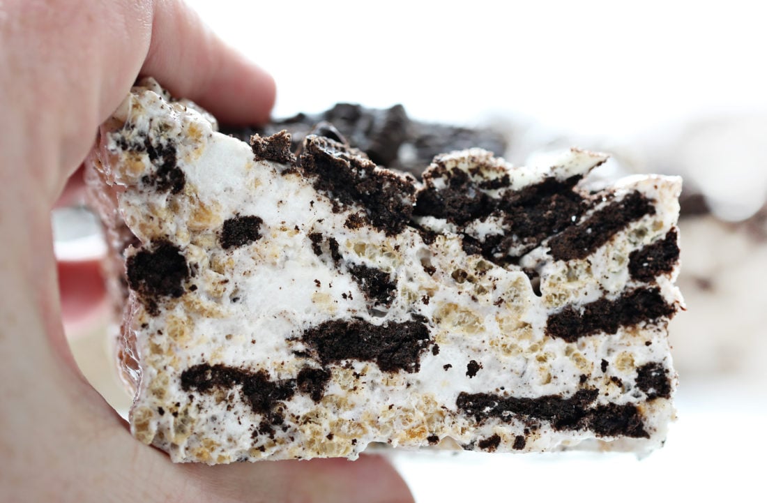 Oreo Rice Krispy Bar Held In Hand Very Close Up.