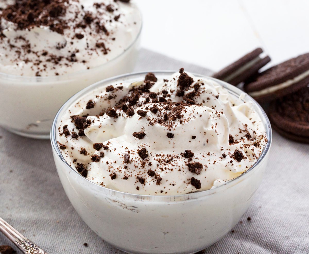 Oreo Fluff in a Glass Bowl Topped with Oreos.