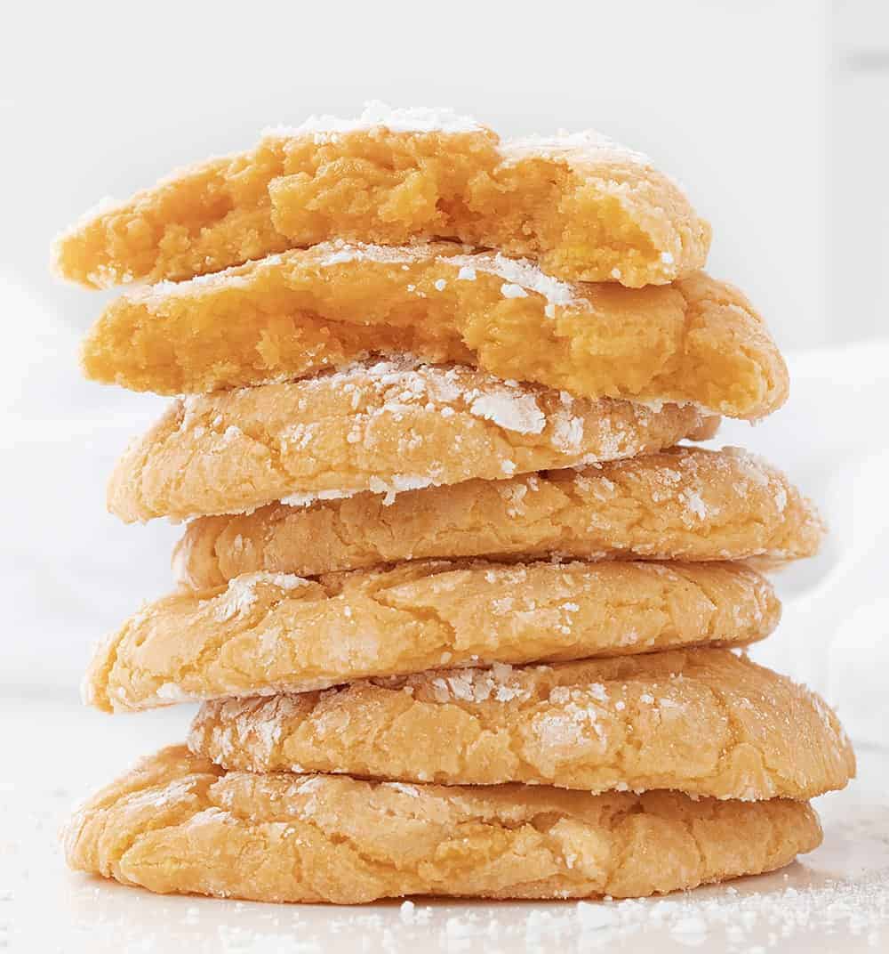 Orange Creamsicle Cookies Stacked on Top of Each other on a White Surface