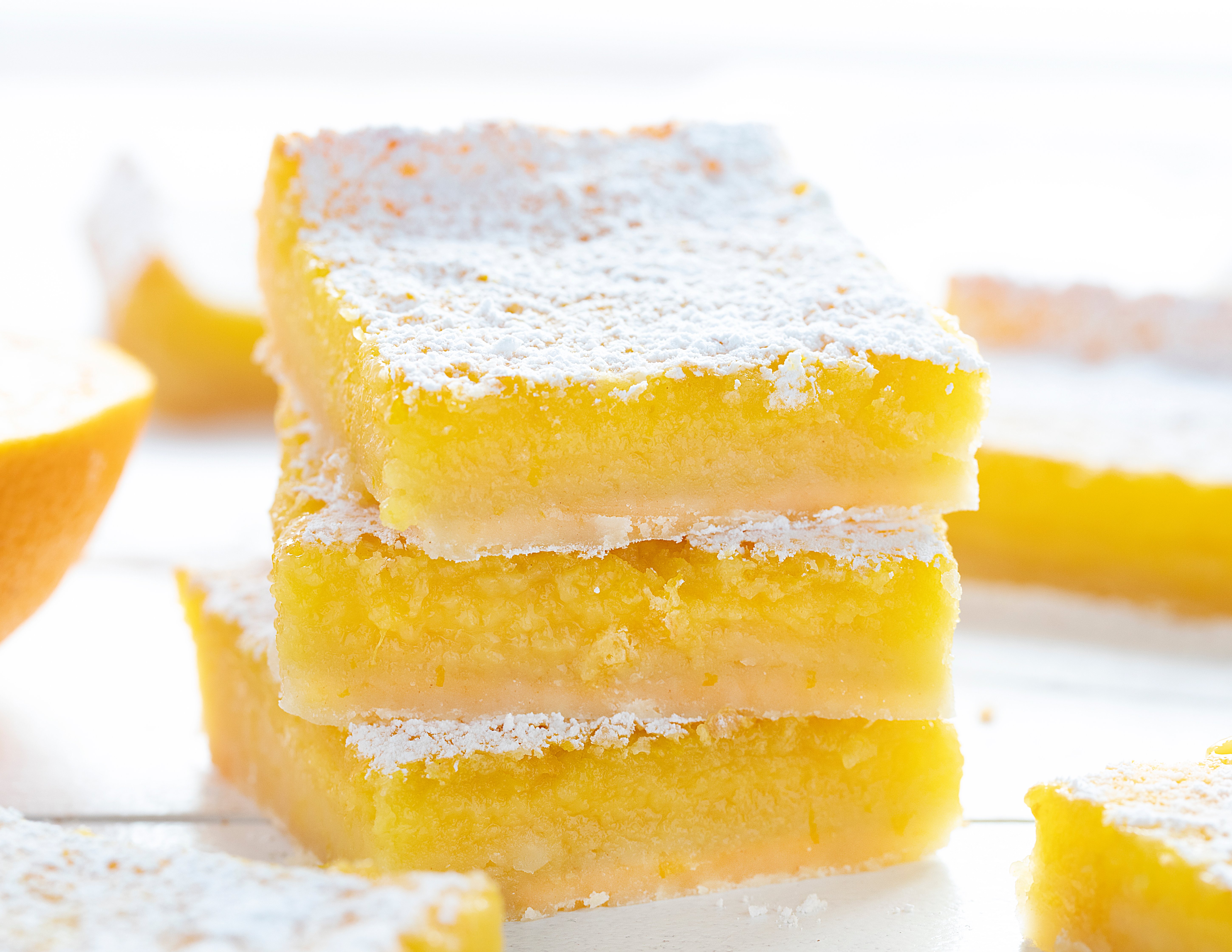 Perfect Orange Bars Stacked on a White Counter. 