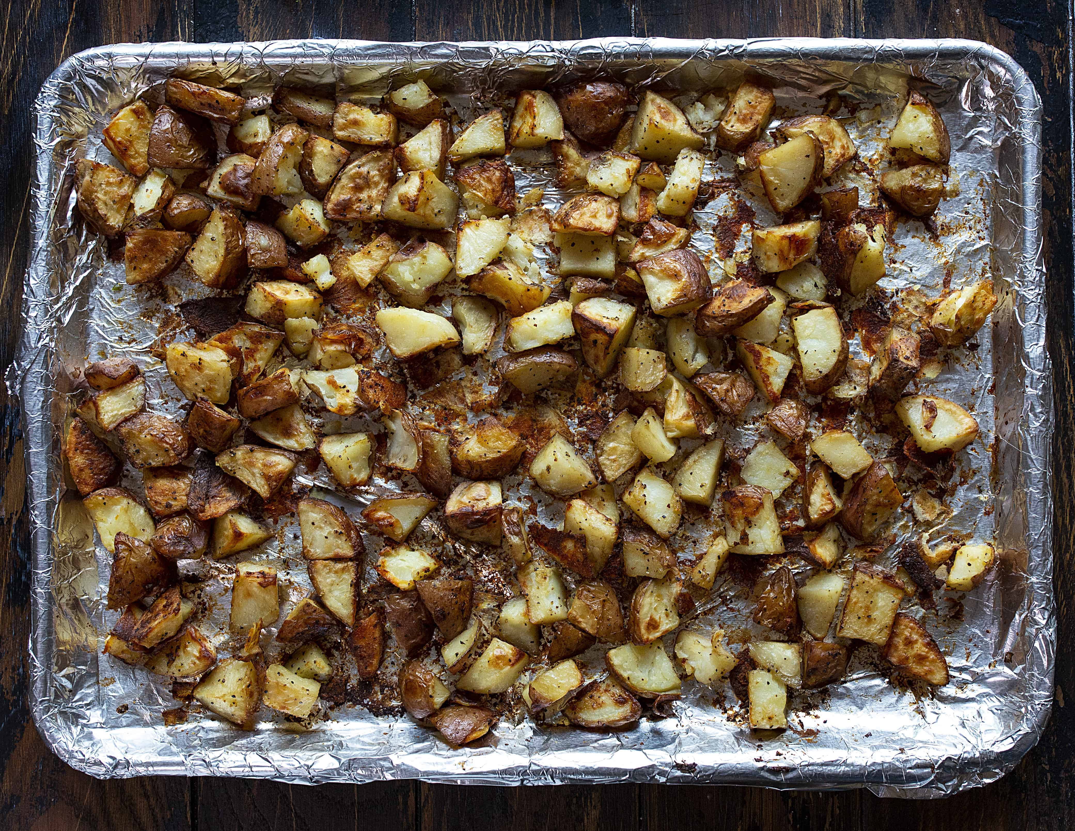 Roasted Potatoes for Potato Salad in a Sheet Pan Lined with Foil.