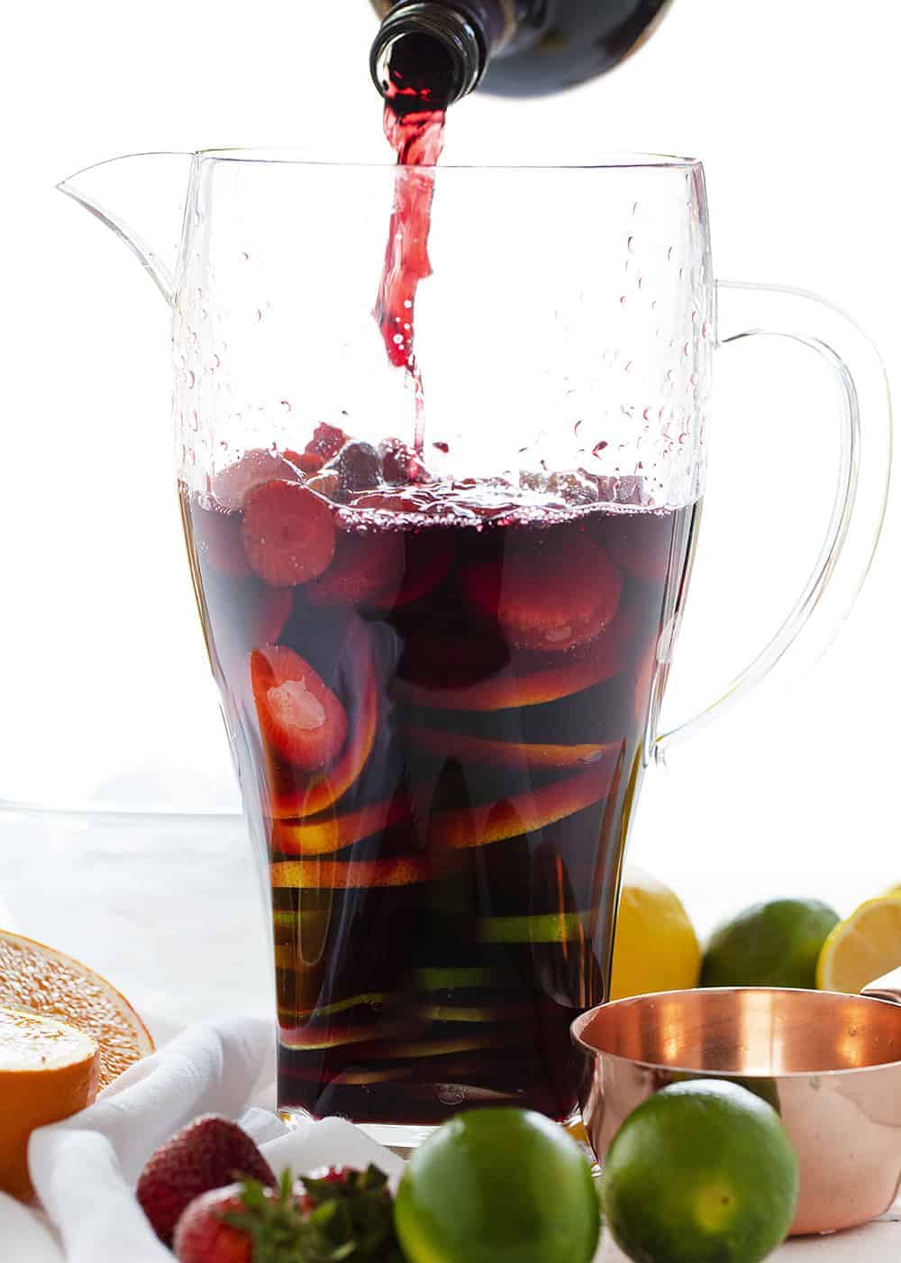Pouring in the wine for your Summer Sangria
