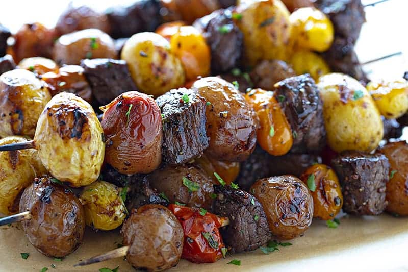 Stacked Garlic and Rosemary Steak Kebabs.