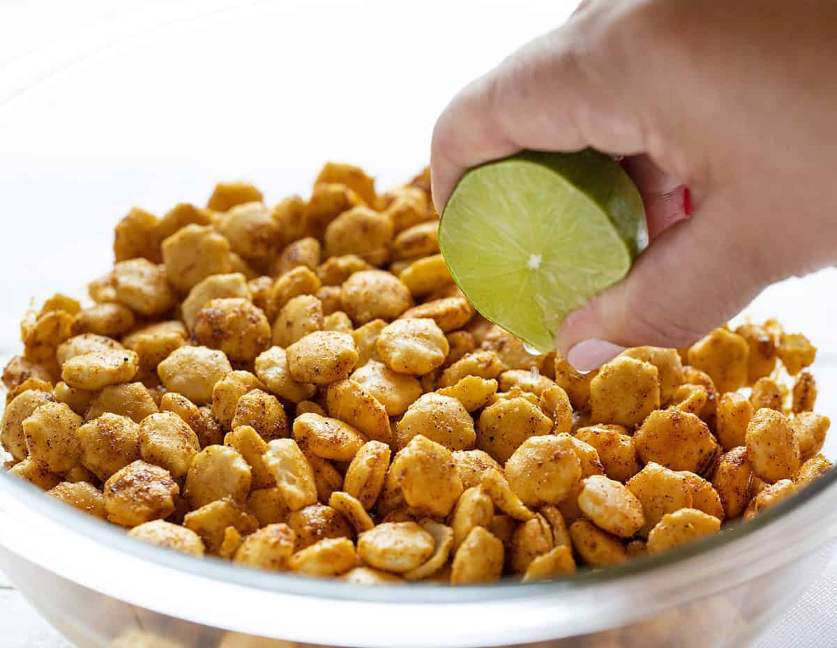 Squeezing Lime Juice on Taco Oyster Crackers