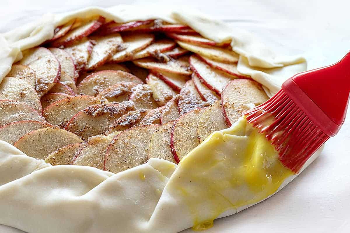 Egg wash on an uncooked Apple Galette