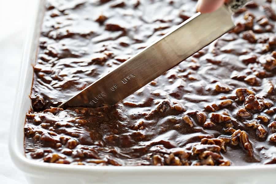 Cutting Into a Dark Chocolate Buttermilk Pecan Cake