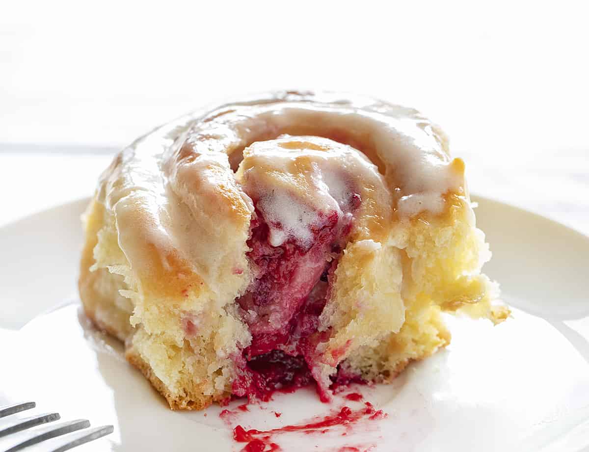 Cut Raspberry Cream Cheese Sweet Roll