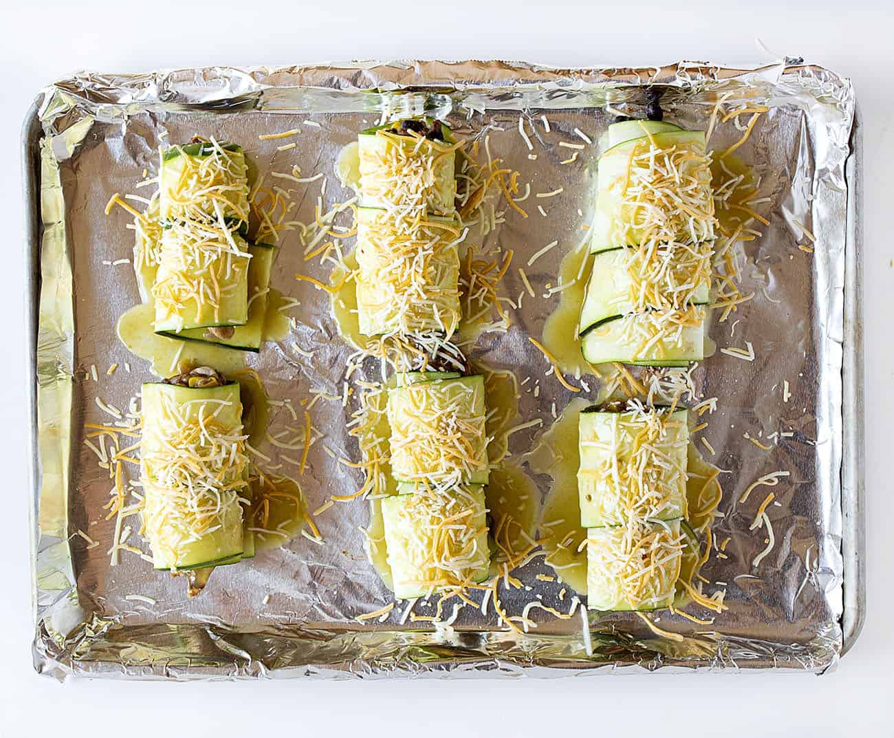 Zucchini Roll Ups before Being Cooked and Sprinkled with Cheese
