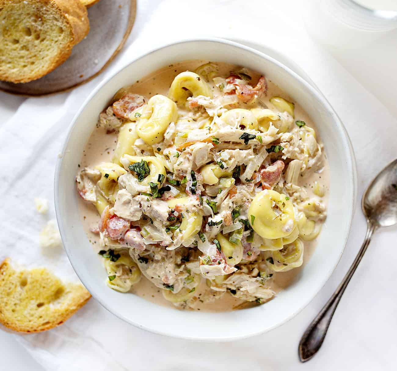 Overhead Bowl of Creamy Chicken Tortellini Soup