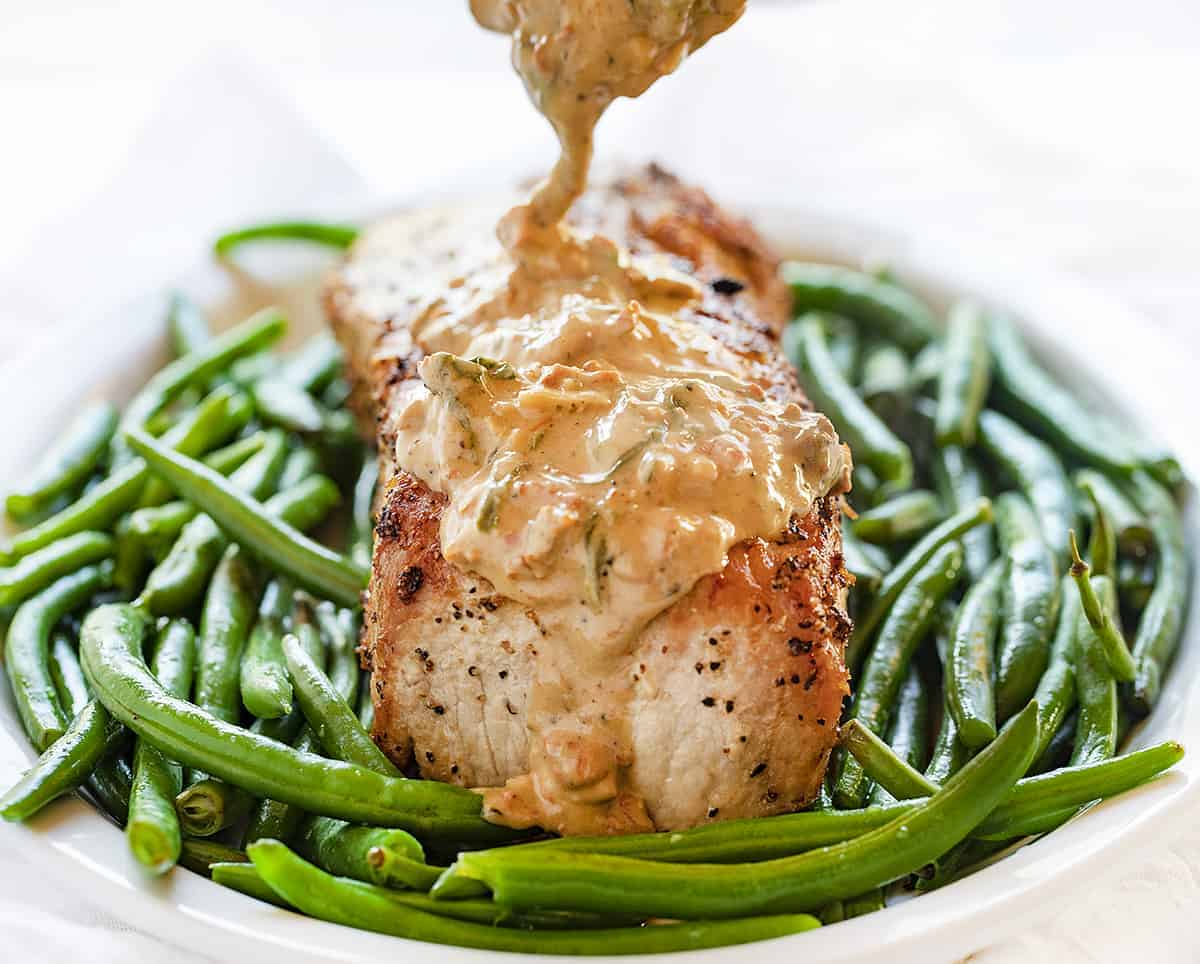 Pork Tenderloin with Parmesan and Roasted Garlic Cream Sauce