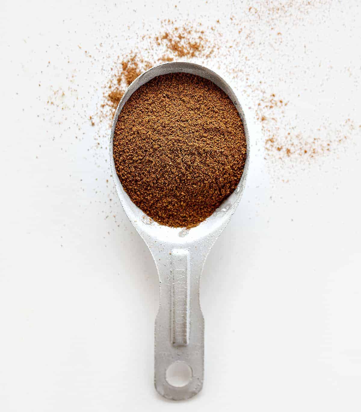 Homemade Pumpkin Pie Spice in a Measuring Spoon.