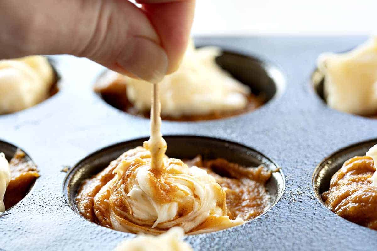 Swirling Cream Cheese in Pumpkin Batter