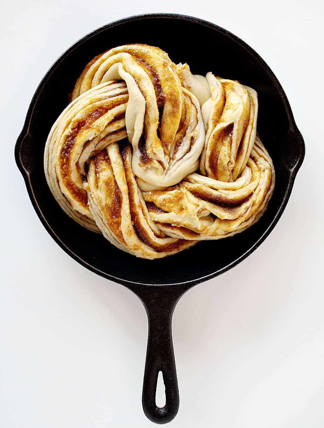 Twisted dough in skillet for Pumpkin Spice Bread Twist