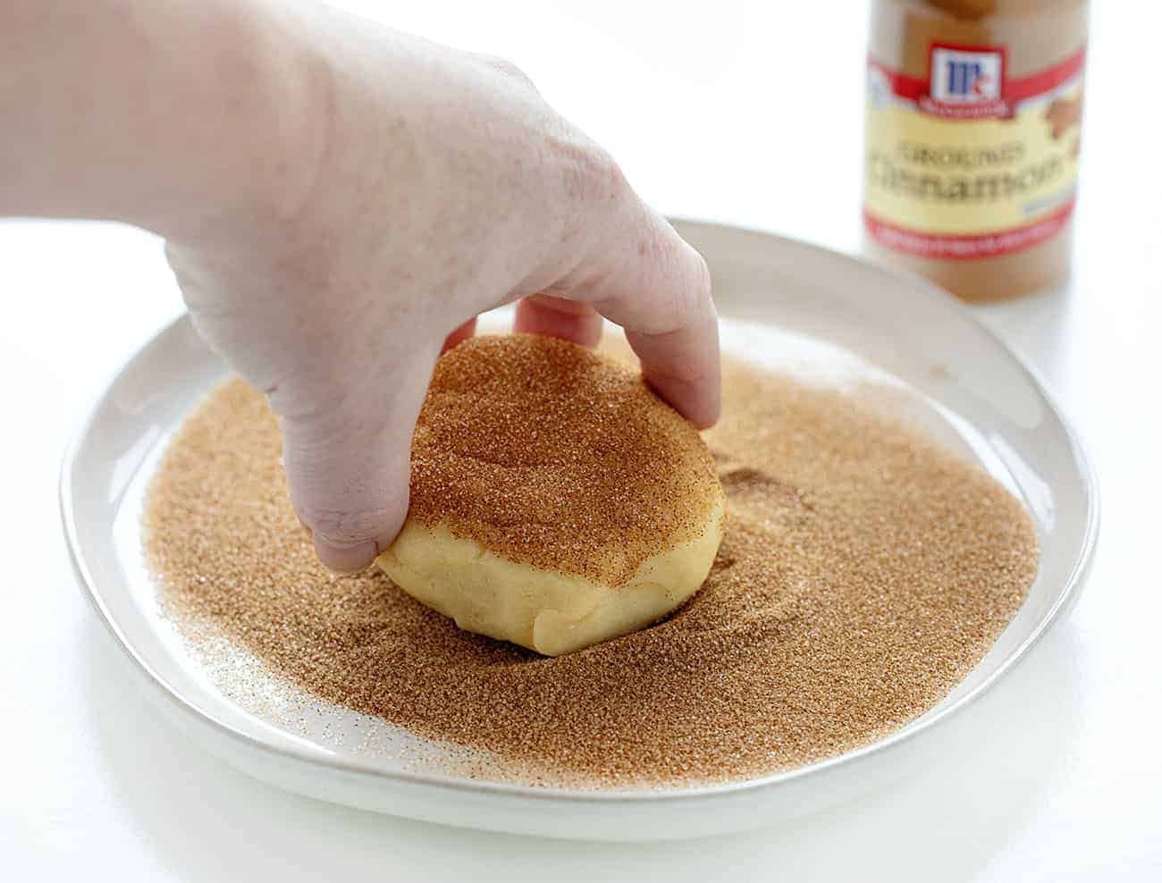 Dropping Snickerdoodle Cookie Dough into Cinnamon and Sugar