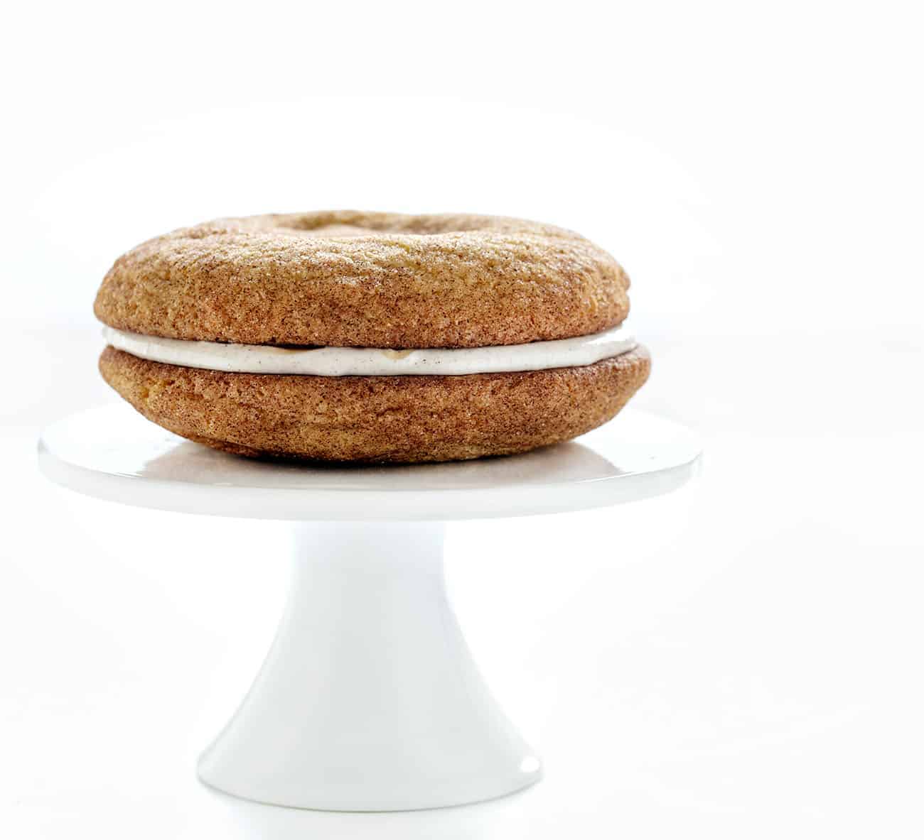 Colossal Snickerdoodle Sandwich Cookie on a Cake Stand