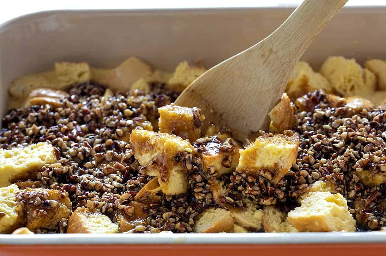 Stirring ingredients for Baked Pecan French Toast