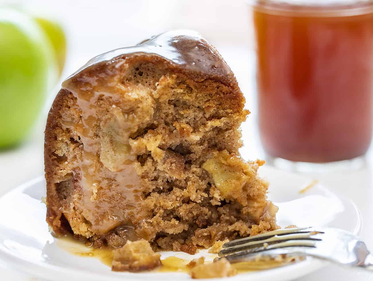 Piece of Cinnamon Apple Moonshine Cake with Bite Taken Out