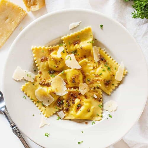 Homemade Five Cheese Ravioli With Garlic Brown Butter Sauce - i am baker