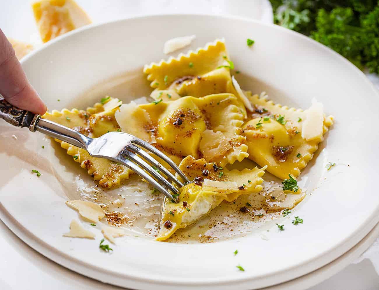 Cut into Piece of Homemade Five Cheese Ravioli Showing the Cheese Filling