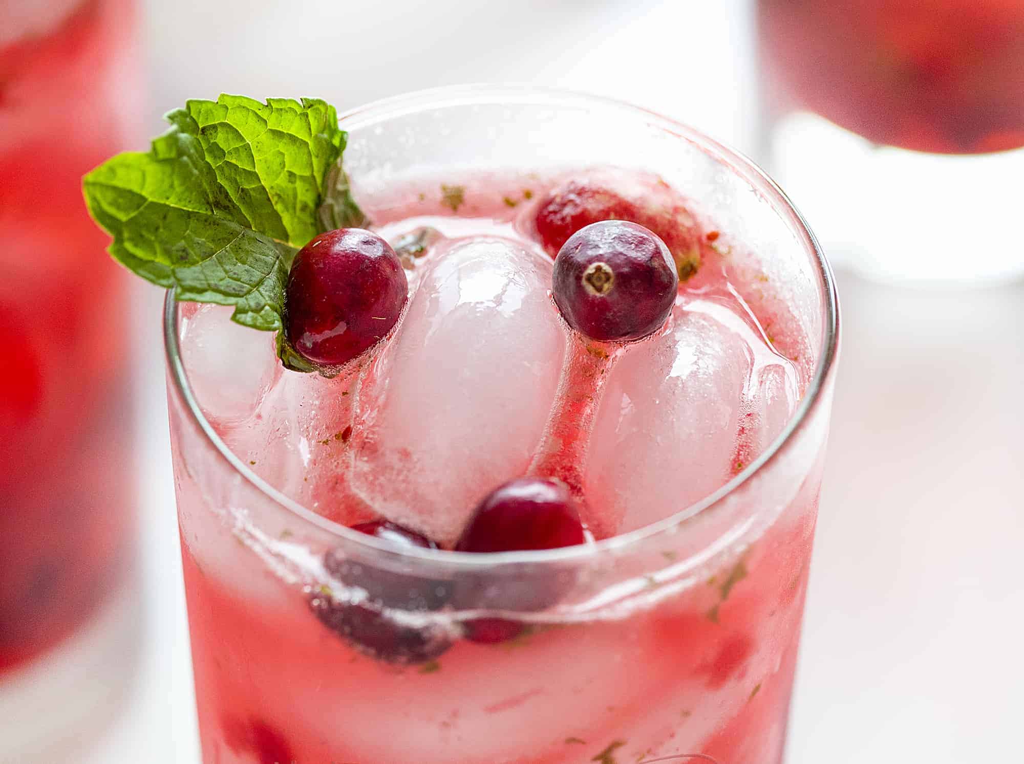 Overhead of cranberry lime mojito
