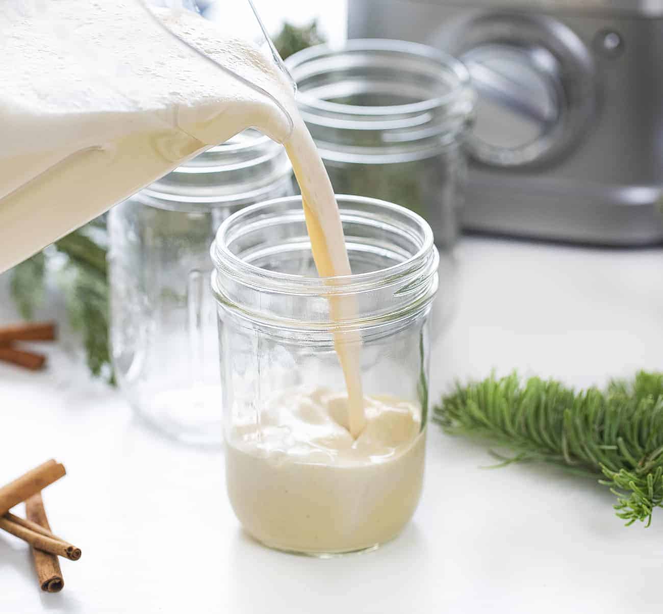 Pouring Easy Blender Eggnog into Jar