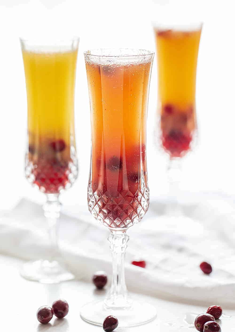 Three Glasses of Cranberry Mimosa