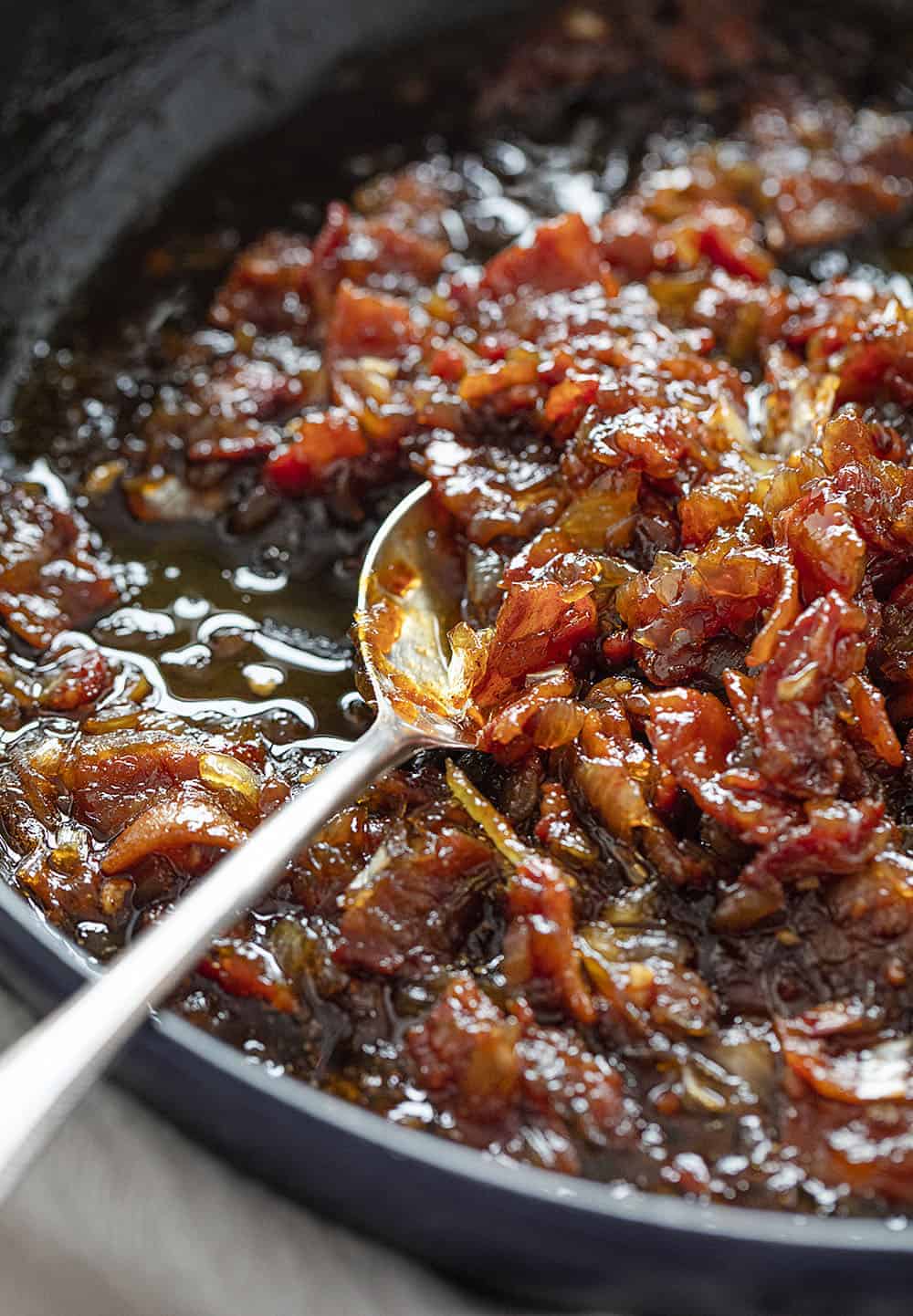 Onion Bacon Jam in a Pan with Spoon