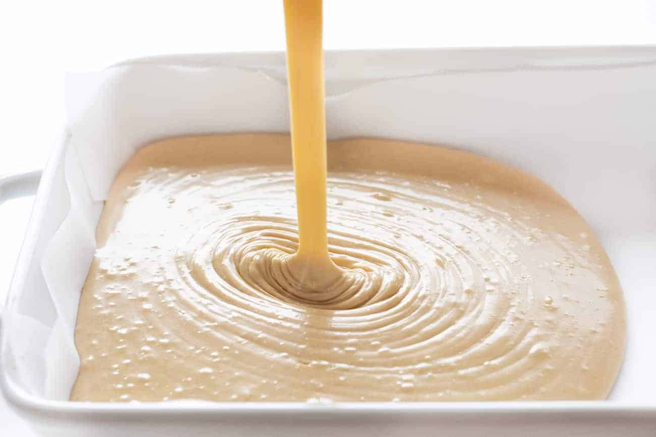 Salted Caramel Fudge being pouring into a pan