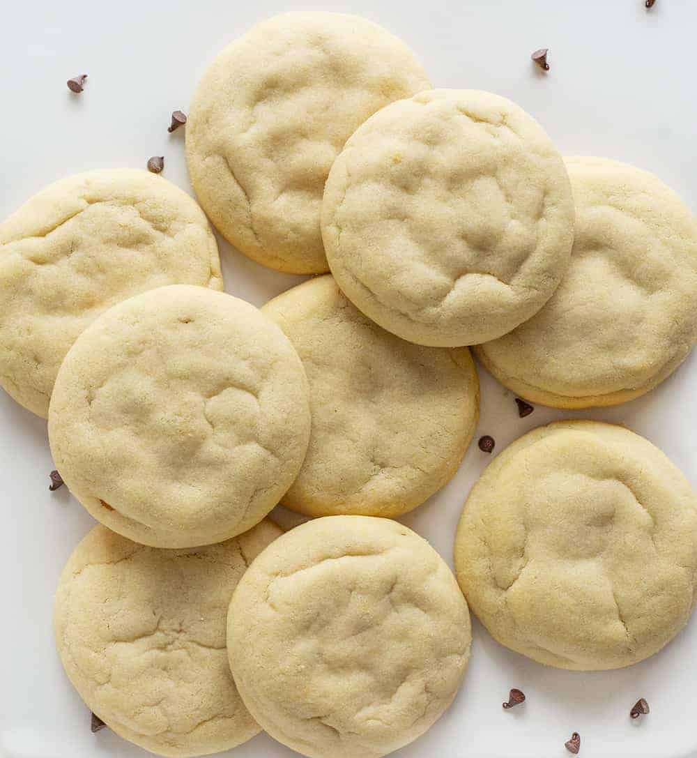 Overhead view of Sugar Cookies with Chocolate Chip Cheesecake Filling on White Platter