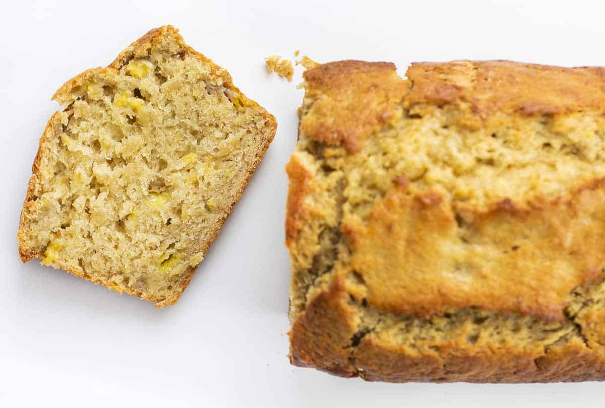 Overhead view of Sourdough Banana Bread with One slice Cut