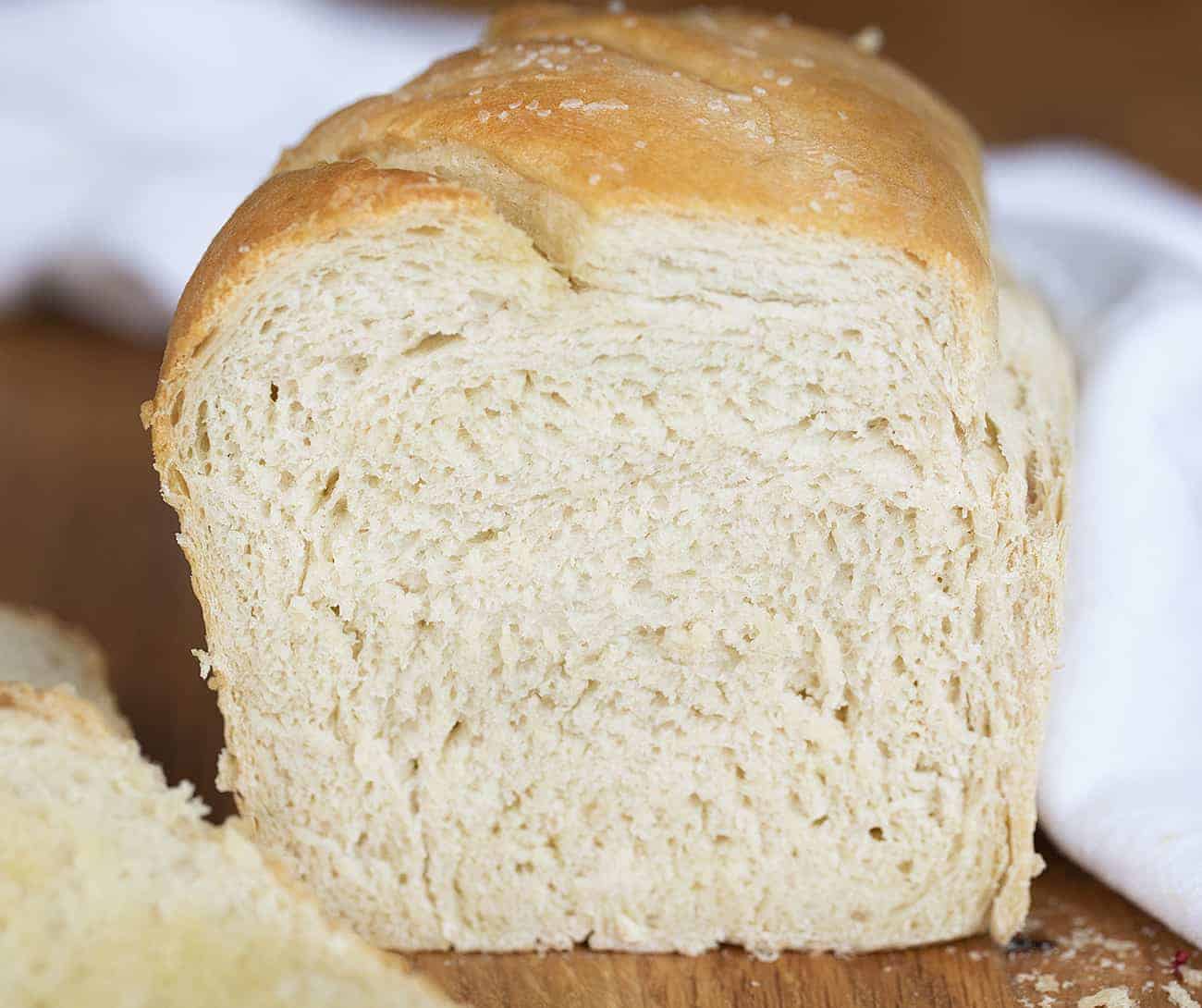 Simple White Bread Recipe on Cutting Board with White Towel