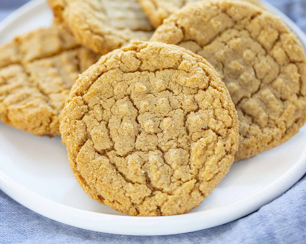 Three Ingredient Peanut Butter Cookies on a White Plate with Blue Napkin