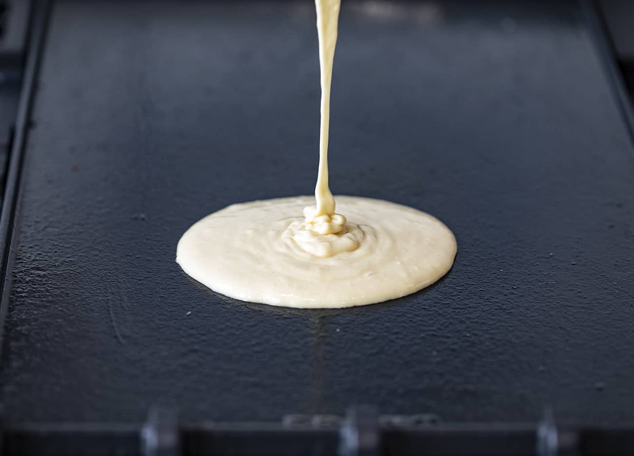 Pouring Sourdough Pancake Batter on Hot Griddle