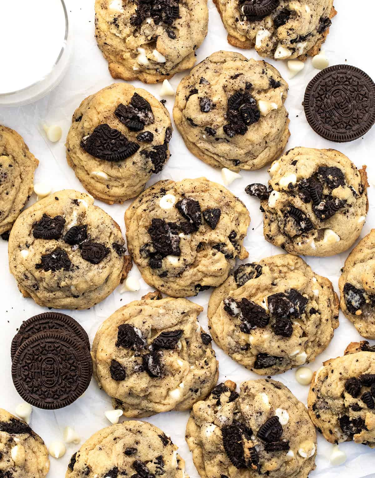 Cookies and Cream Cookies or Oreo cookies laid out on a white table from overhead.
