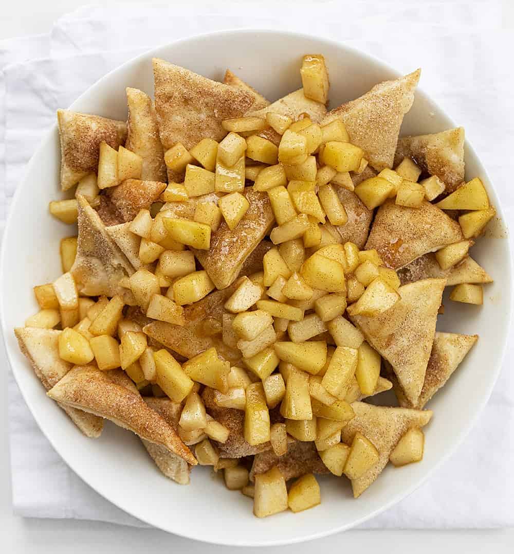 Overhead Image of White Bowl with Homemade Apple Pie Nachos in it on White Napkin