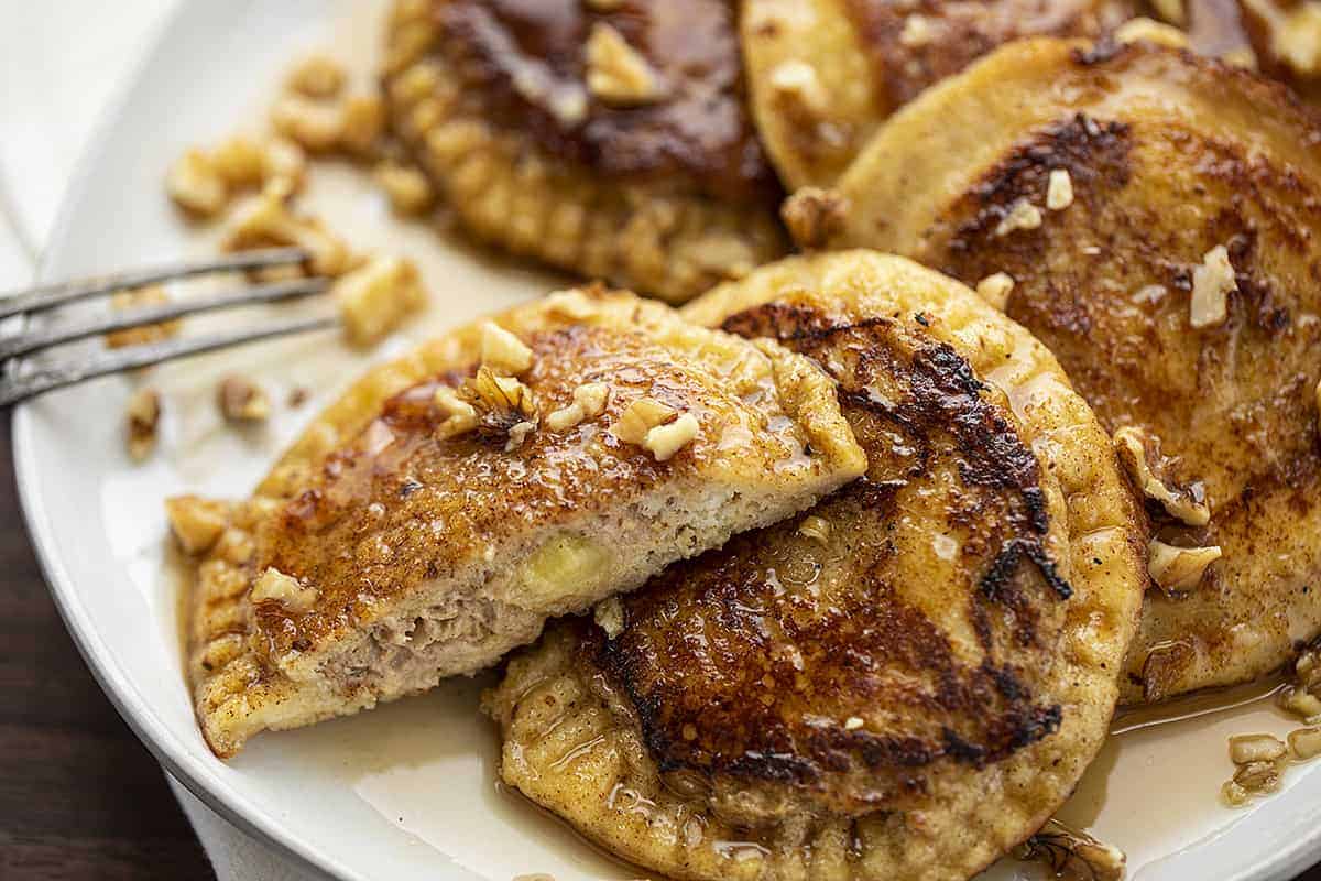 Cut Into Banana Bread French Toast on a White Plate with Fork