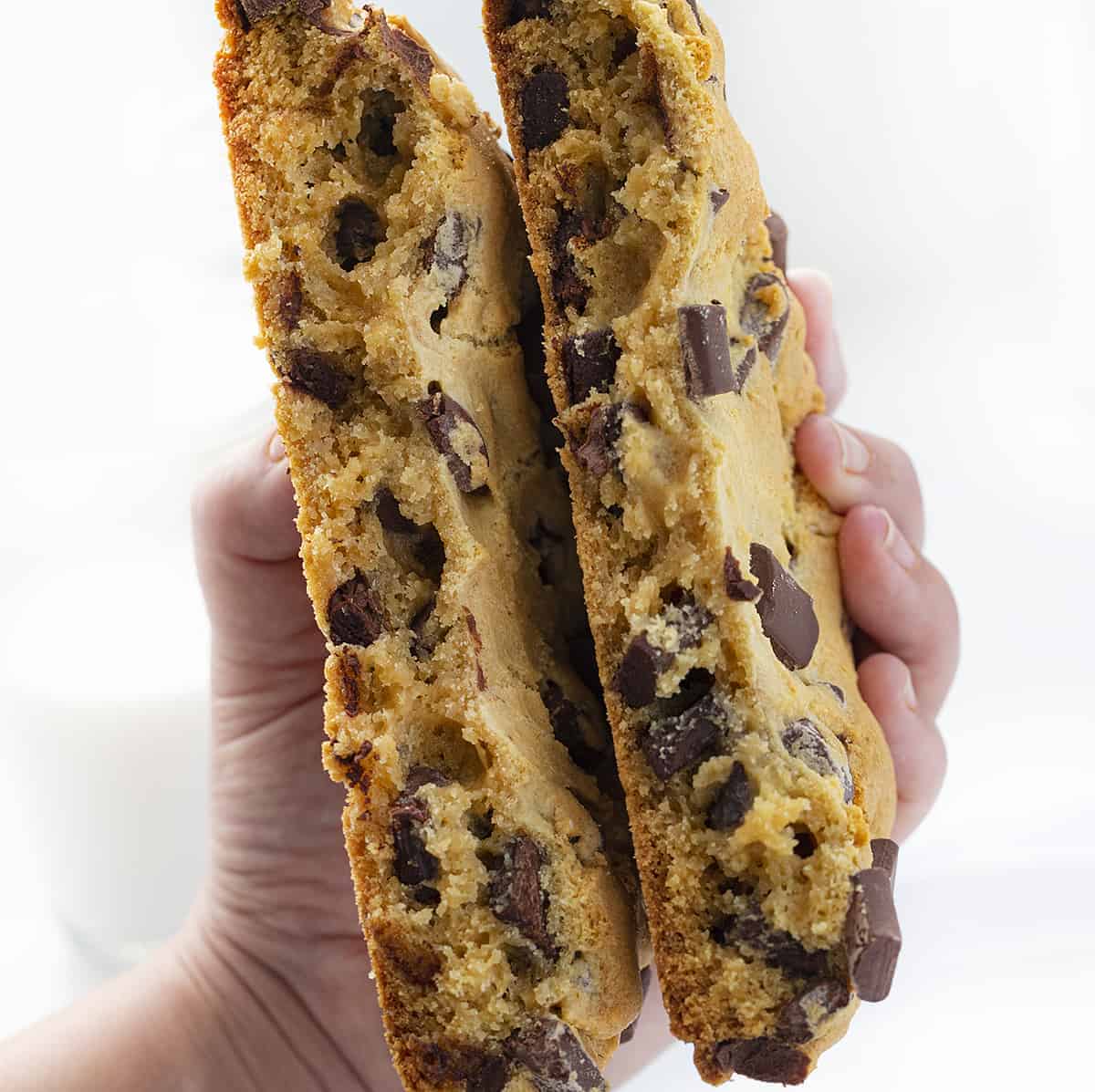 Hand Holding Giant Chocolate Chip Cookie
