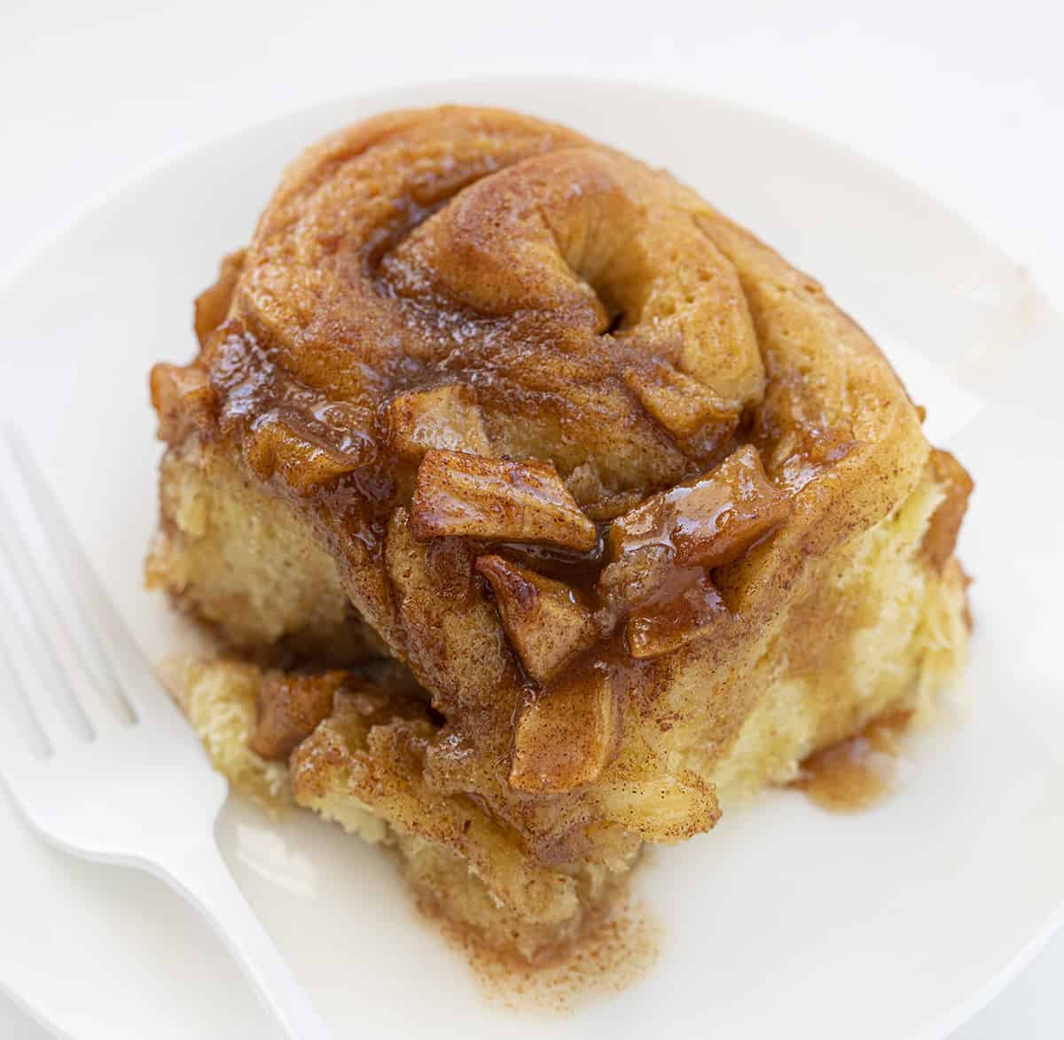 Apple Cinnamon Roll on White Plate with White Fork