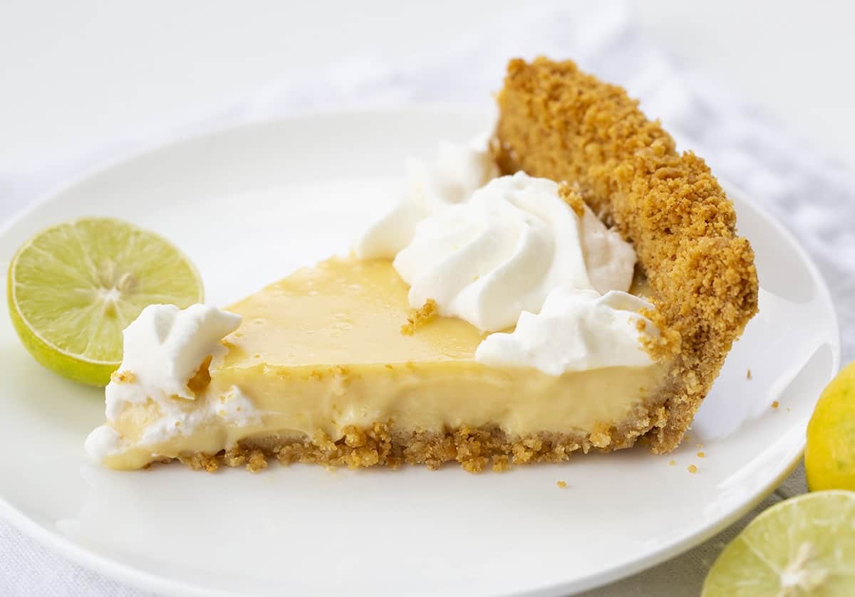 Slice of Key Lime Pie Showing the Side - tall crust and creamy filling