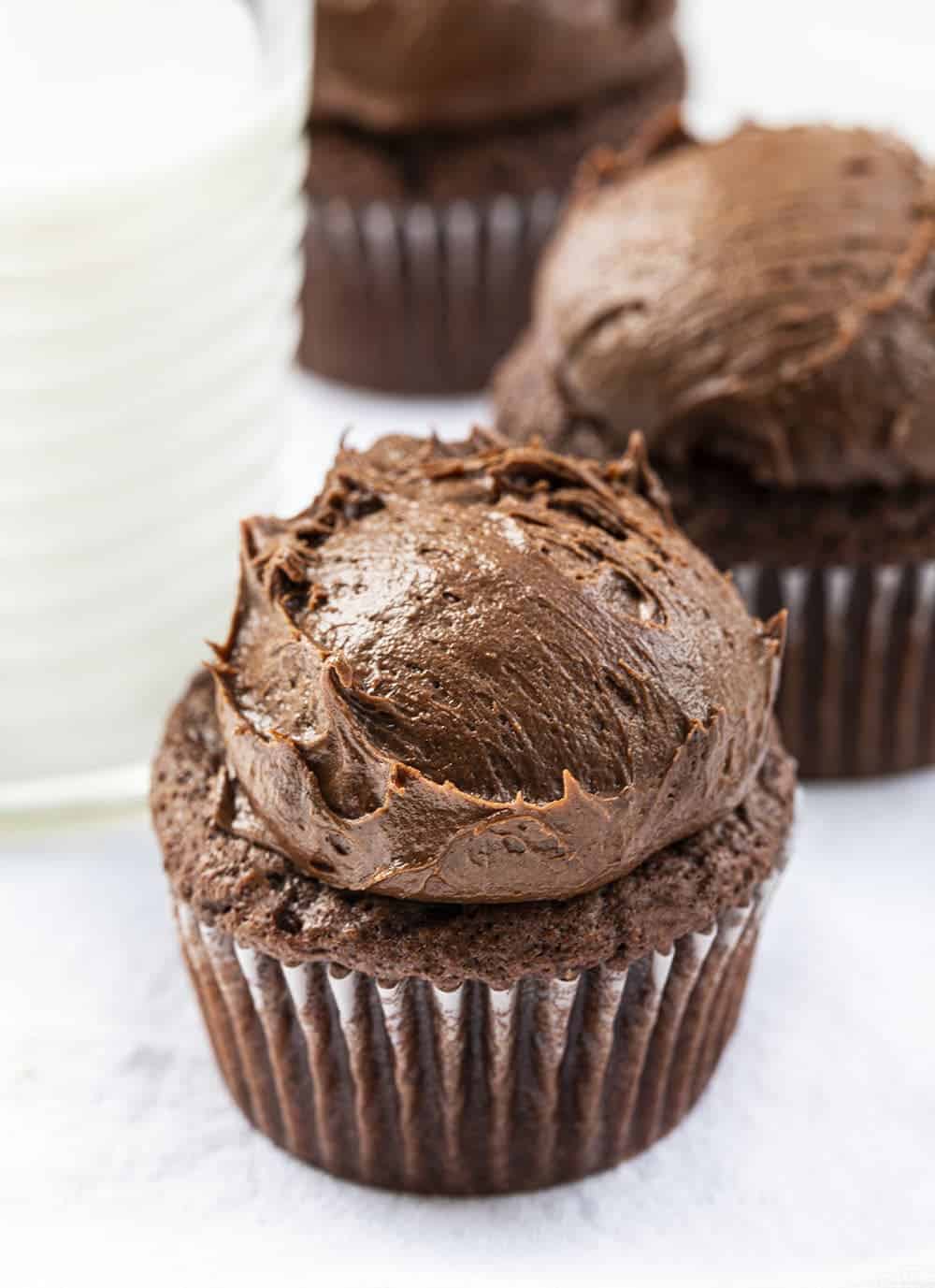 Chocolate Brownie Cupcakes with Rounded Frosting on Top
