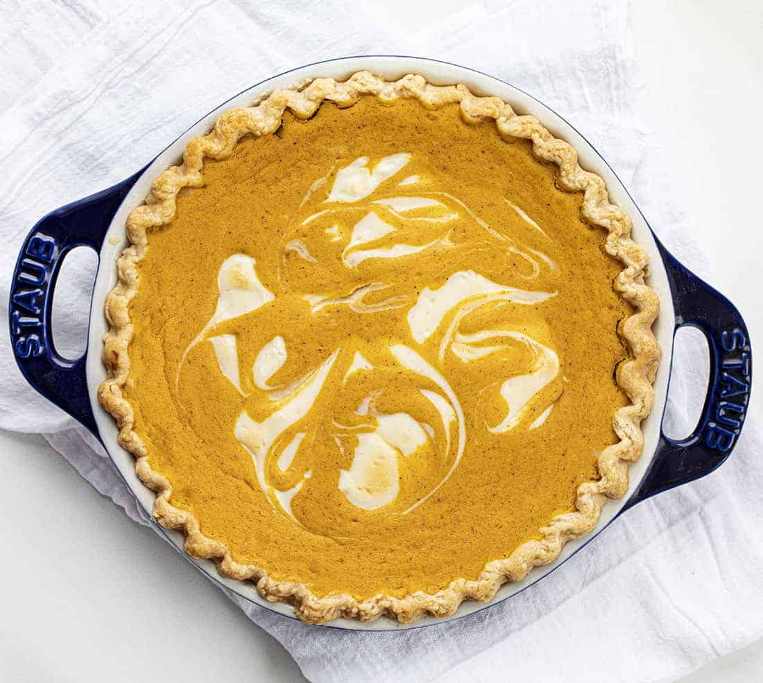 Pumpkin Cream Cheese Swirl Pie showing Homemade Pie Crust