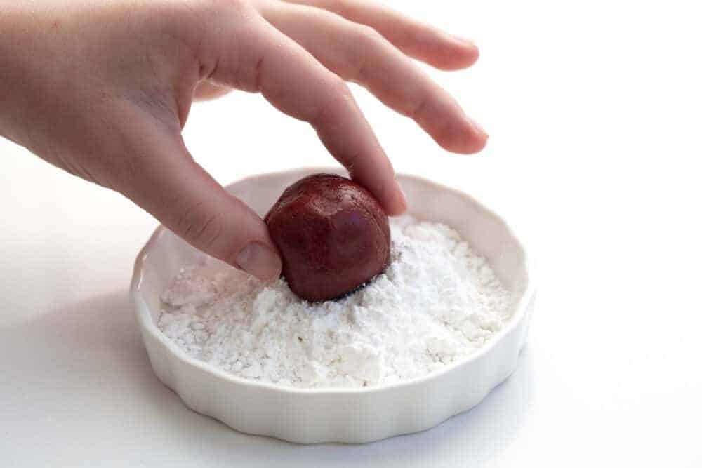 Rolling Dough into Confectioners Sugar