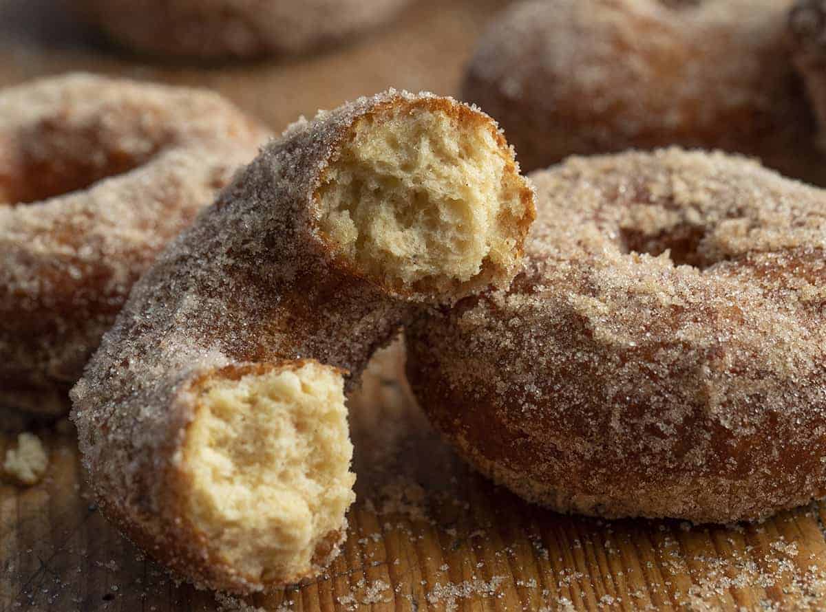 Half Fried Apple Cider Donut on Cutting Board