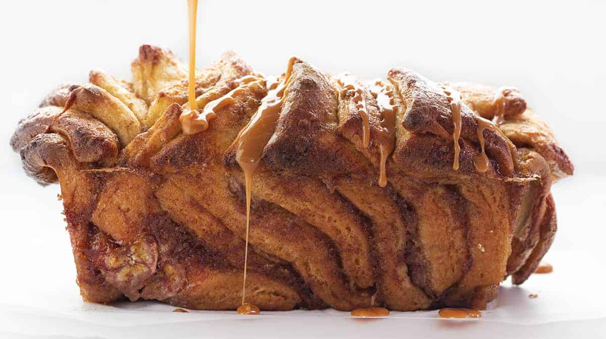 Drizzling Caramel over Bananas Foster Pull-Apart Bread